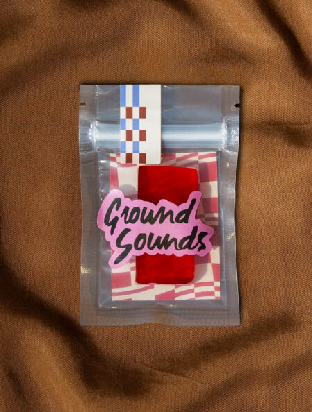 Red strawberry Gummies in a Ground Sounds labeled package